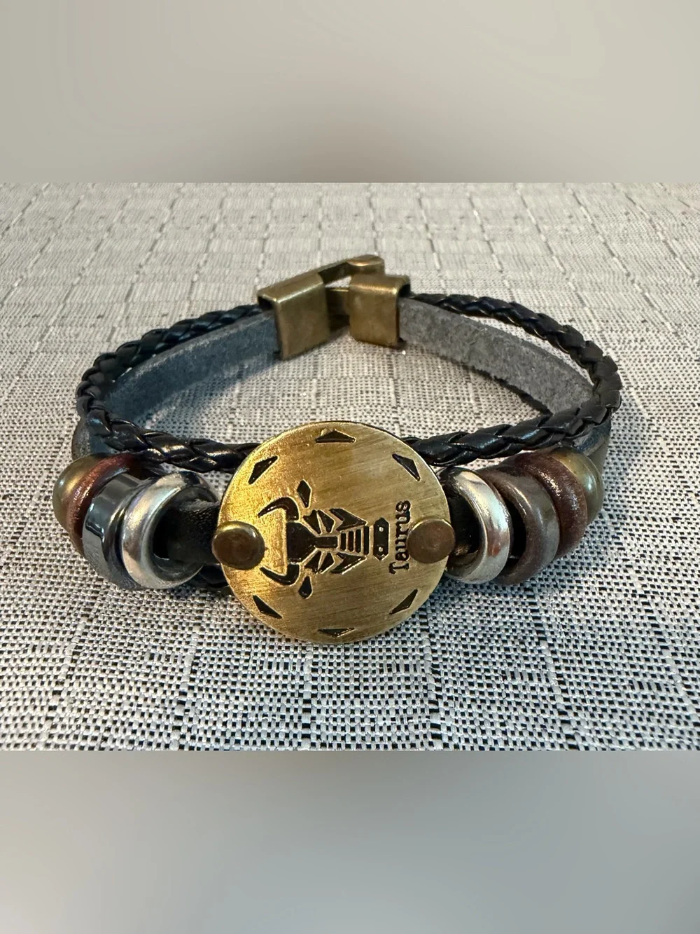 Black Leather Taurus Bracelet with Brass Accent
